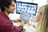 male-female-business-executives-interacting-while-working93975.jpg