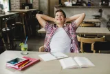 delighted-youngster-relaxing-while-studying96334.jpg