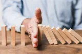 businessman-using-wooden-pieces122608.jpg